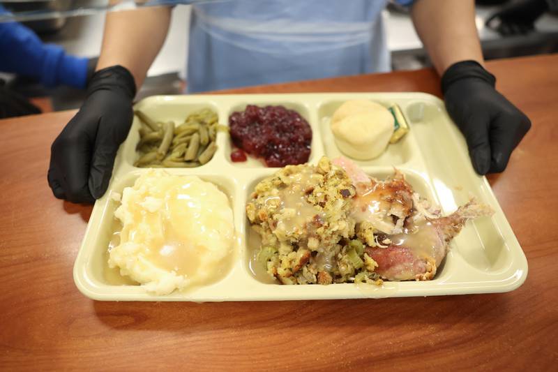 A Thanksgiving meal is prepared at the Daybreak Center on Thursday. The faith based organization is expected to serve over 100 meals to members of the community on Thanksgiving Day in Joliet.