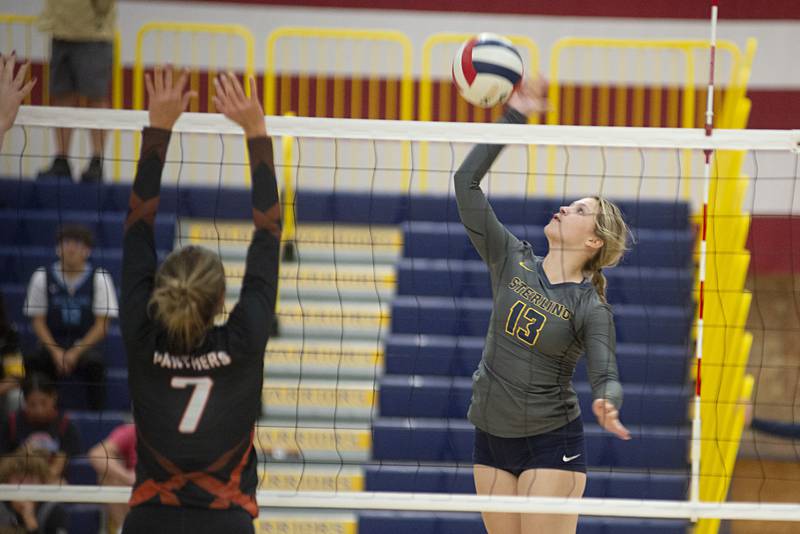 Sterling’s Katie Dittmar spikes the ball Monday, Sept. 26, 2022 against Washington.