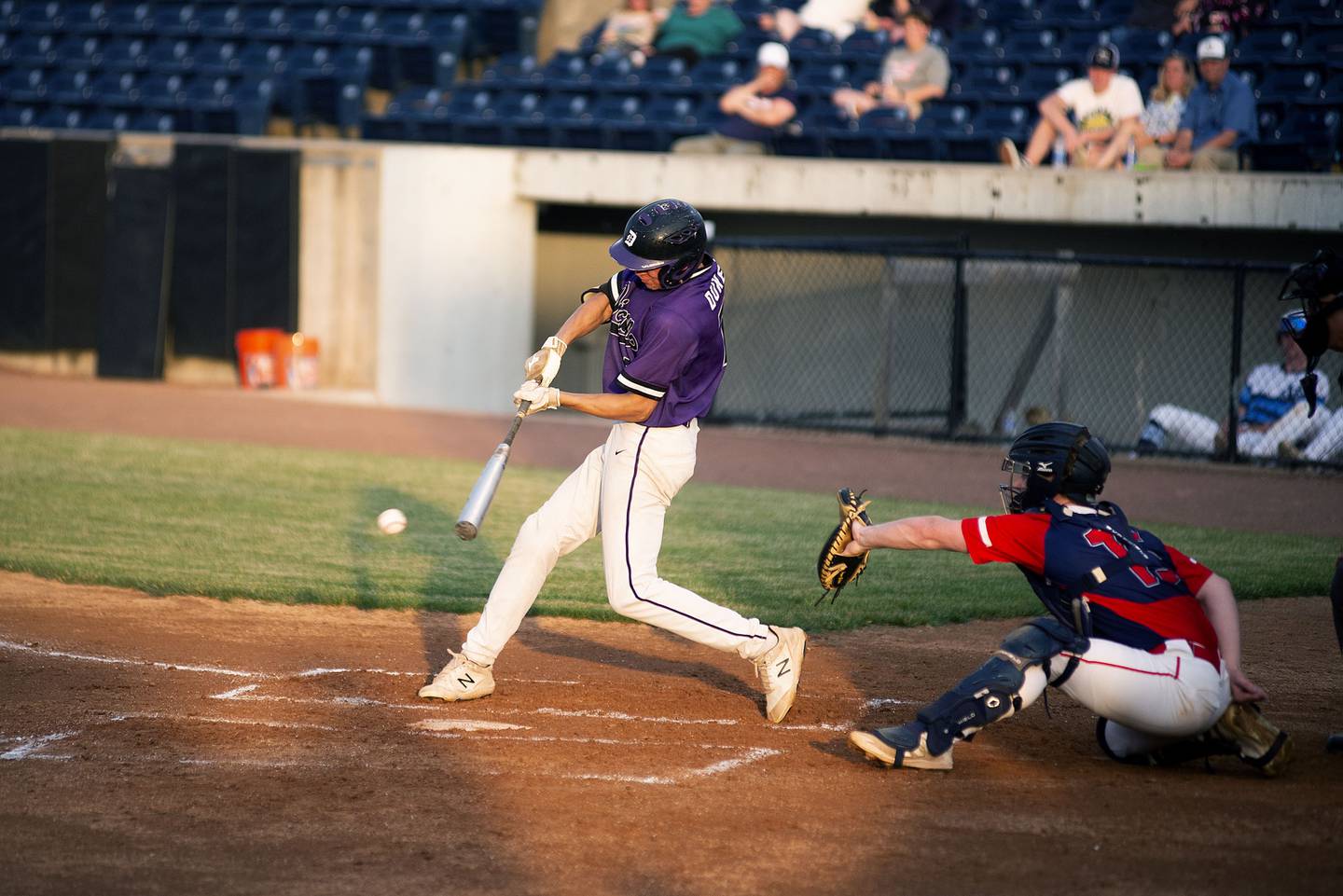Dixon’s Gage Burdick drives the ball up the middle Monday June 13, 2022 during the NIC-10 vs Big Northern Conference senior all-star game.