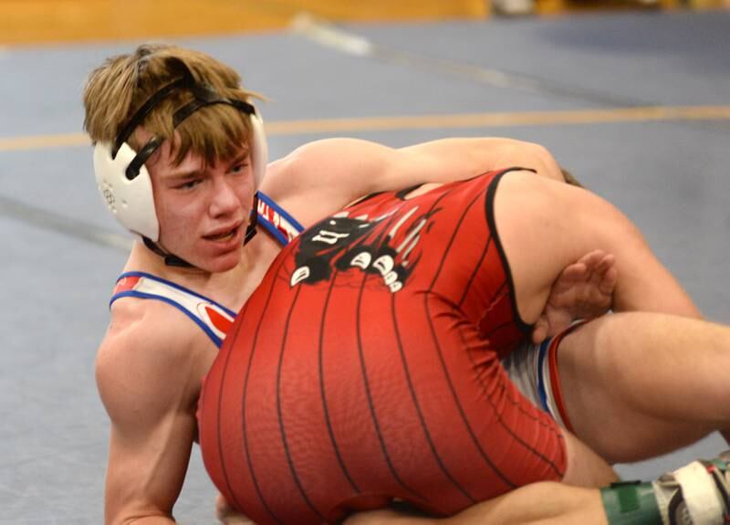 Oregon's Jackson Messenger battles Erie-Prophetstown's Aidan Jepson during the 138-pound title bout at the Polo Wrestling Invitational on Saturday, Jan. 11, 2025 at Polo High School. Jepson won the match.