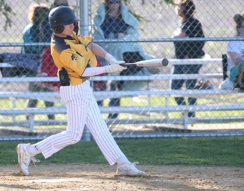 Putnam County's AJ Furar connects with a hit against Woodland/Flanagan-Cornell on Tuesday, April 9, 2024 at Woodland High School.