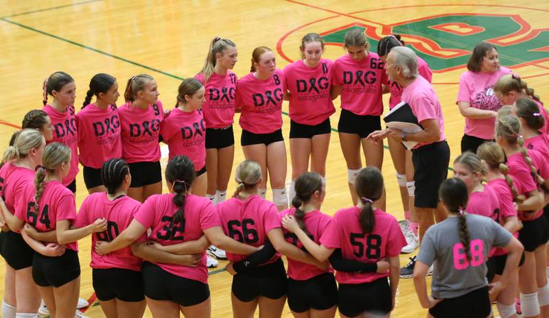 Members of the L-P volleyball team huddle before the game against St. Bede during the "Cavs 4 A Cause" pink night event on Tuesday, Sept. 26, 2023 at Sellett Gymnasium.
