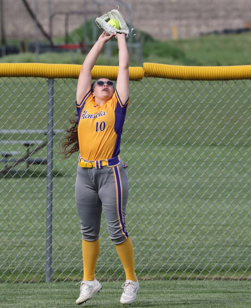 Mendota left fielder Talia White makes a catch Monday at Princeton.