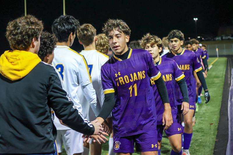 Players of Mendota show sportsmanship to players of Aurora Central Catholic High School on Saturday, November 2, 2024 at Richard E. Phalen, SR. Field in Mendota.