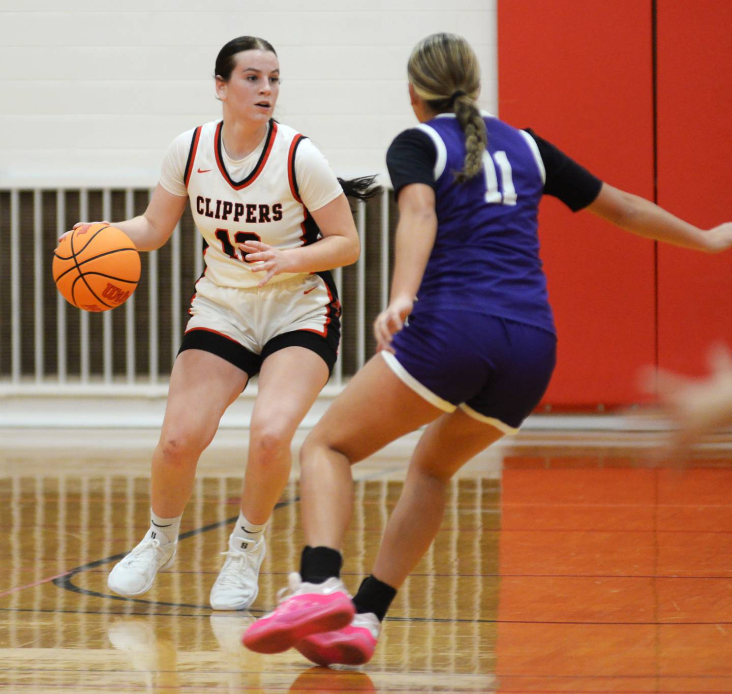 Amboy's Addison Pertell (11) looks to pass as  a Rochelle player defends at the Oregon Girls Basketball Tip-Off Tournament on Wednesday, Nov. 20, 2024 at the Blackhawk Center in Oregon.