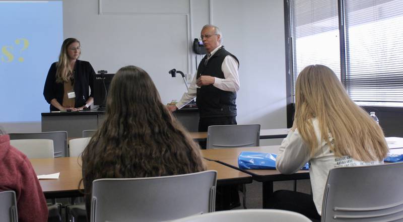 High school students taking part in the Pathways Education Symposium listen to a presentation about elementary education from Chelsea Stuart (at the desk) and Narcisco Puentes (standing, right) at Sauk Valley Community College on Friday, April 21, 2023.