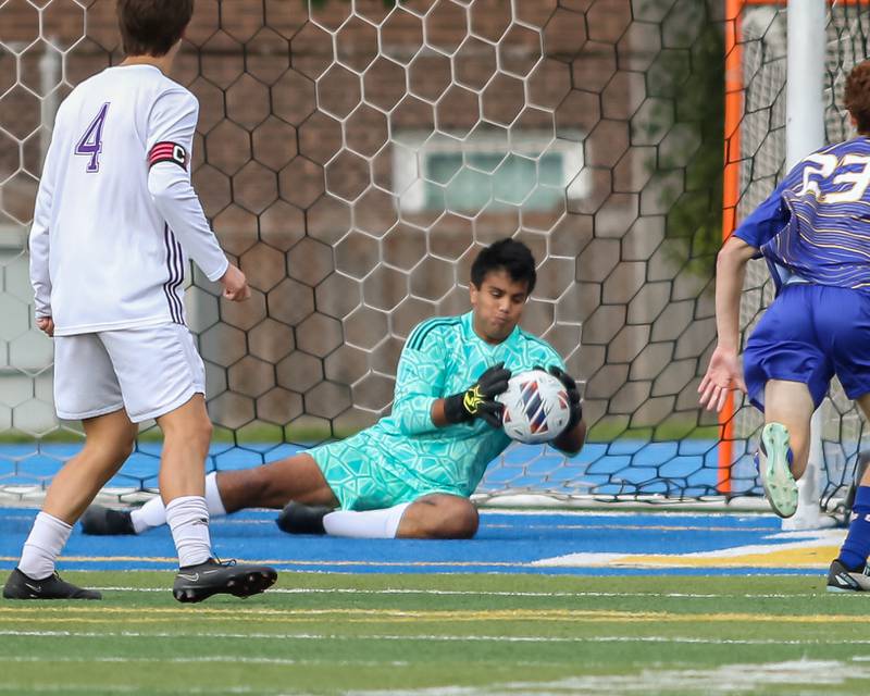 Downers Grove North's Adi Zaveri1 (1) makes a save during Class 3A Lyons Regional final soccer match.  Oct 21, 2023.