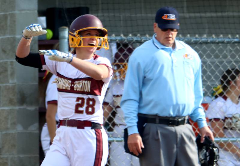 Richmond-Burton’s Madison Kunzer is all smiles after scoring on a Lyndsay Regnier three-run triple against Stillman Valley in softball sectional title game action in Richmond Friday evening.