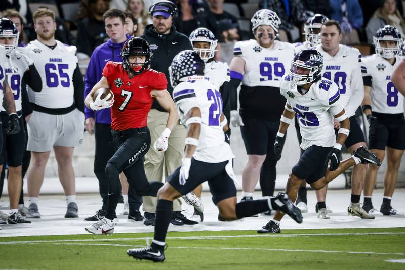 North Central College receiver and Hinsdale Central graduate Thomas Skokna (7) runs with the ball during the 51st Stagg Bowl against Mount Union.