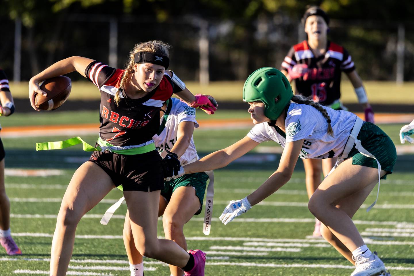 Bradley-Bourbonnais's Elise Munsterman dodges the defense during a varsity flag football Romeoville Regional semifinal game against Plainfield Central at Romeoville on Oct. 7, 2025.