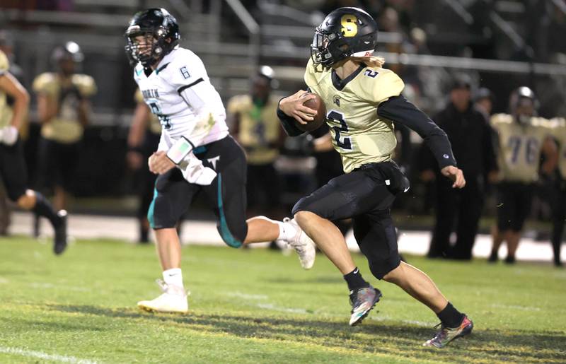 Sycamore's Elijah Meier finds some running room during their game against Woodstock North Friday Oct. 7, 2022, at Sycamore High School.