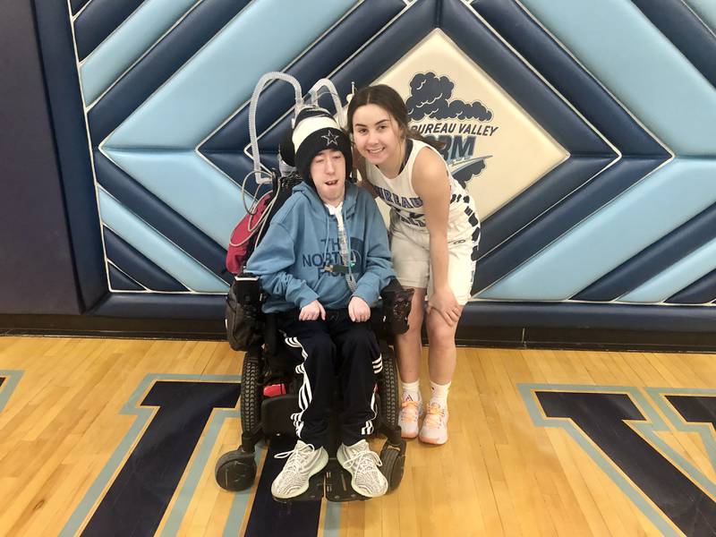 Keegan and Kaleen Carlson, seniors at Bureau Valley High School, have twin telepathy, their mother, Tammy said. Keegan, who was born with Centronuclear Myopathy, is his sister's biggest fan.