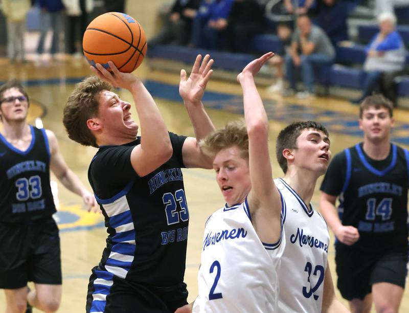 Hinckley-Big Rock's Luke Badalshoots over Newark's Kellen Westerfield Friday, Feb. 6, 2026, during their Little 10 Conference third place game at Somonauk High School.