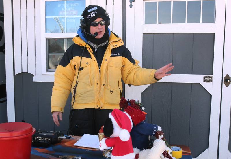 WLBK Radio host TD Ryan broadcasts Thursday, Dec. 5, 2024, during Freezin’ For Food in the Hy-Vee parking lot off of DeKalb Avenue in Sycamore. WLBK’s Freezin’ For Food collects non-perishable food items and monetary donations to help restock The Salvation Army’s food pantries in DeKalb County.