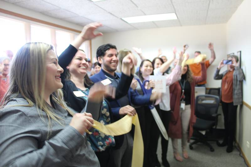 YWCA Northwestern Illinois employees celebrate the opening of the new Crystal Lake office at 8600 Route 14.