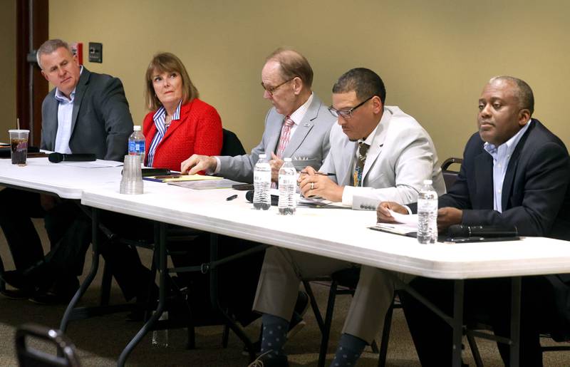 Current DeKalb Mayor and candidate for re-election Cohen Barnes (L-R) Barbara Larson, 2nd Ward Alderwoman and candidate for re-election, Michael Embrey, candidate for 2nd Ward Alderman, John Walker, current 7th Ward Alderman and candidate for mayor, and Kouame Sanan, candidate for mayor, prepare for questions Wednesday, Feb. 19, 2025, during the DeKalb Area Rental Association and DeKalb Area Builders Association Candidate Night at Faranda's Banquet Center in DeKalb.