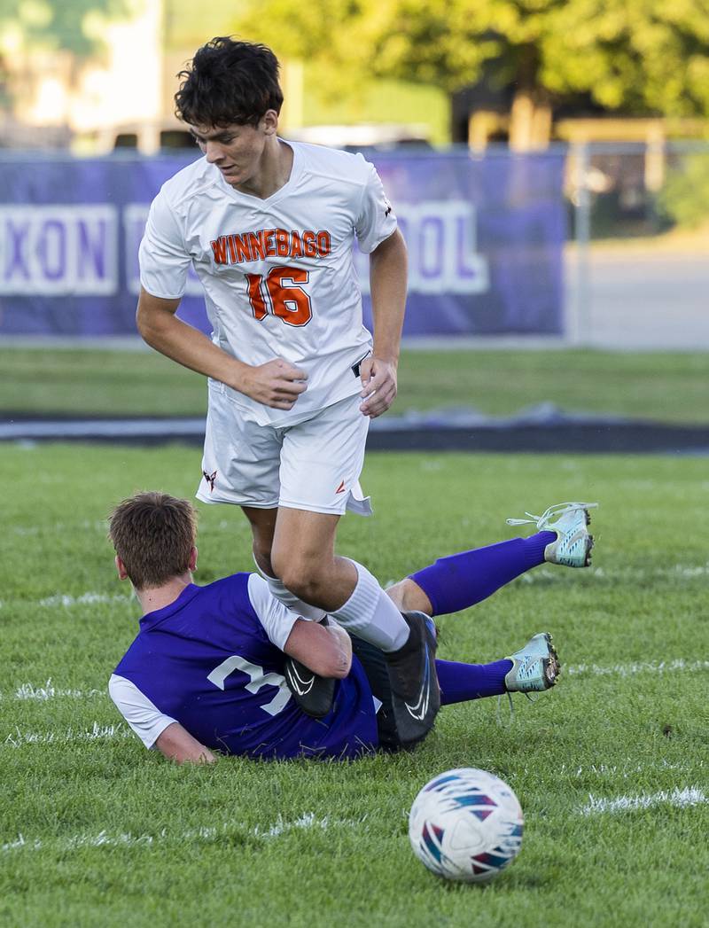 Dixon’s Dylan Osmer and Winnebago’s Eli Intravaia get tangled up Thursday, Sept. 26, 2024, at Dixon High School.