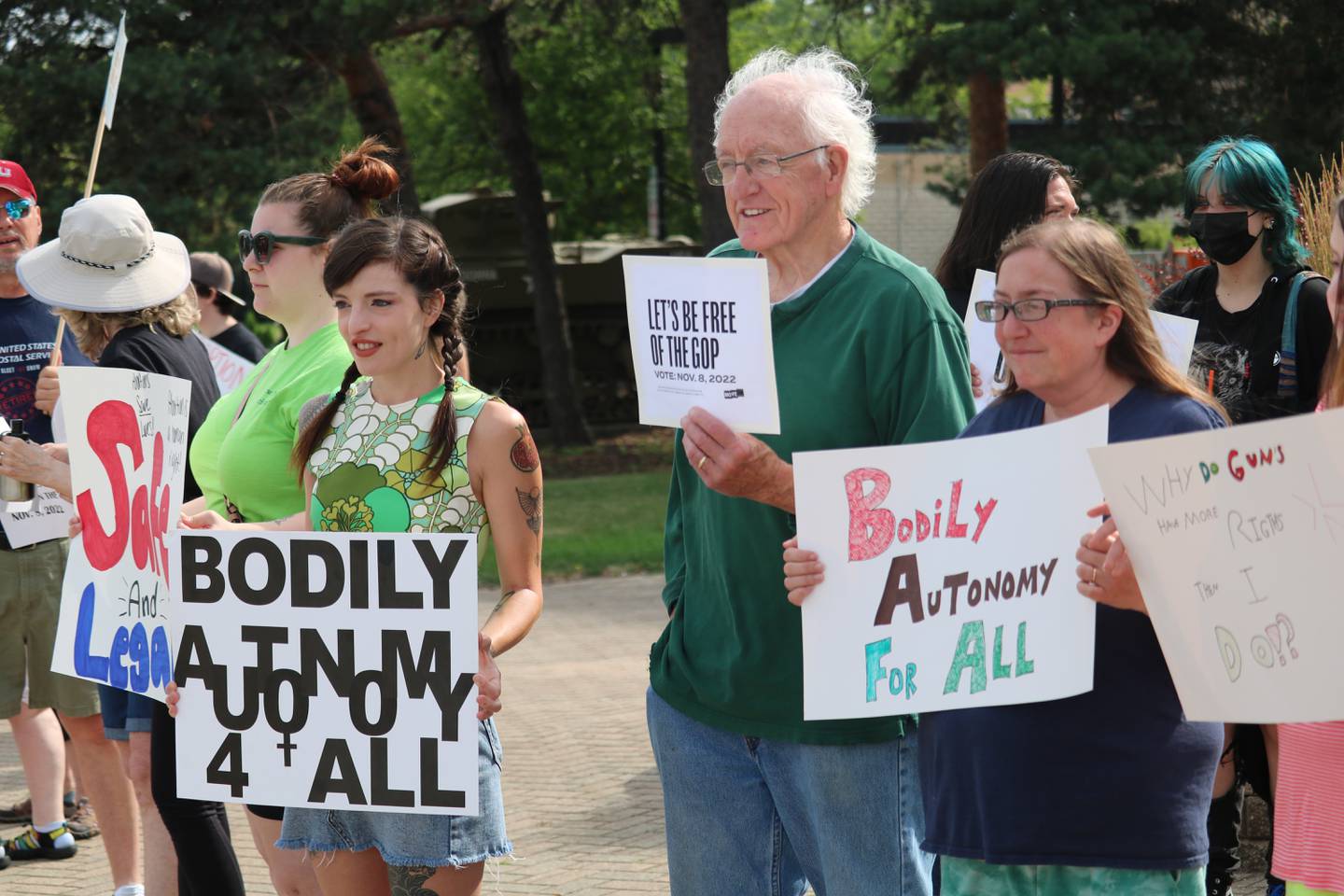 Attendees rally for reproductive rights during a protest on Monday, July 4, 2022 at the corner of First Street and Lincoln Highway in downtown DeKalb. The Independence Day gathering was organized to protest a recent ruling by the U.S. Supreme Court to overturn Roe v. Wade, which protected access to abortion under federal law.