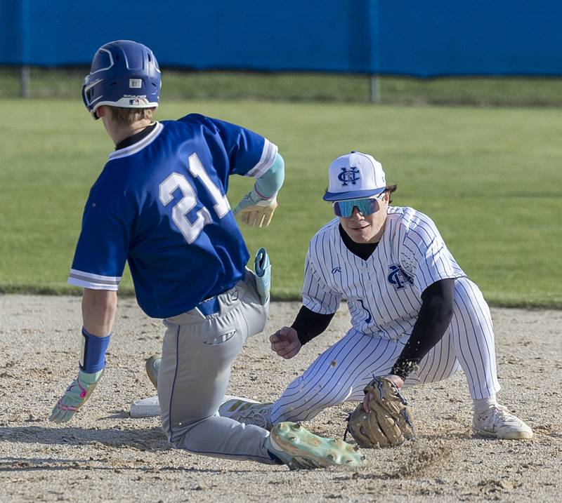Newman’s Garret Matznick tags out Princeton’s Braden Shaw Monday, April 6, 2026.