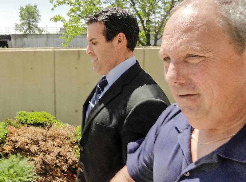 Joliet police officer Nicholas Crowley leaves the Will County Courthouse May 16 in Joliet.