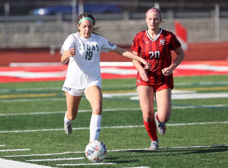 Lyons Township's Brennan Israel (19) chases down the ball during the girls varsity soccer match between Lyons Township and Hinsdale Central high schools in Hinsdale on Tuesday, April 18, 2023.