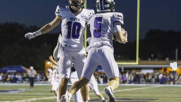 Photos: Downers Grove North, Downers Grove South renew rivalry on the gridiron