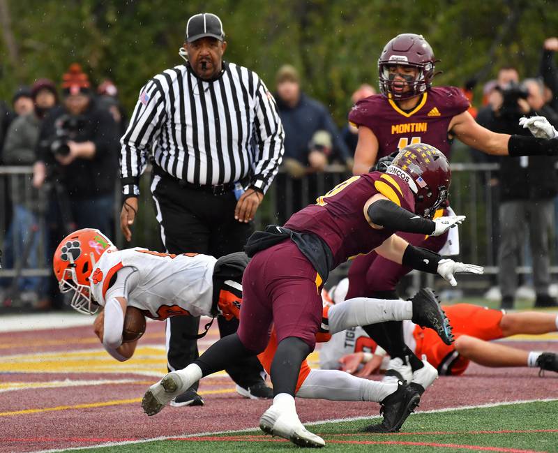Byron quarterback Andrew Talbert dives into the end zone for a touchdown against Montini during a Class 3A second-round game on November 9, 2024 at Montini Catholic High School in Lombard.