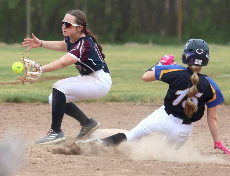 Marengo’s Abby Balmes, left, forces out Aurora Central Catholic’s Corina Maratea at second base in varsity girls softball IHSA Class 2A Regional Title Game action on Friday, May 22, 2026 at Raymond Benoy Field on the campus of Marian Central High School in Woodstock.