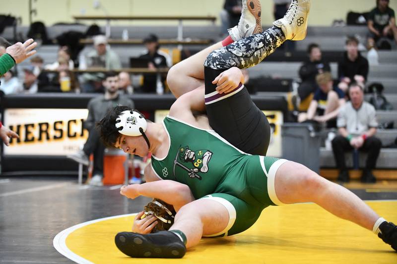 Coal City's John Keigher pins Manteno's Carter Nunley in their 215-pound match on Saturday, Feb. 8, 2025, in the IHSA Class 1A Herscher regional.