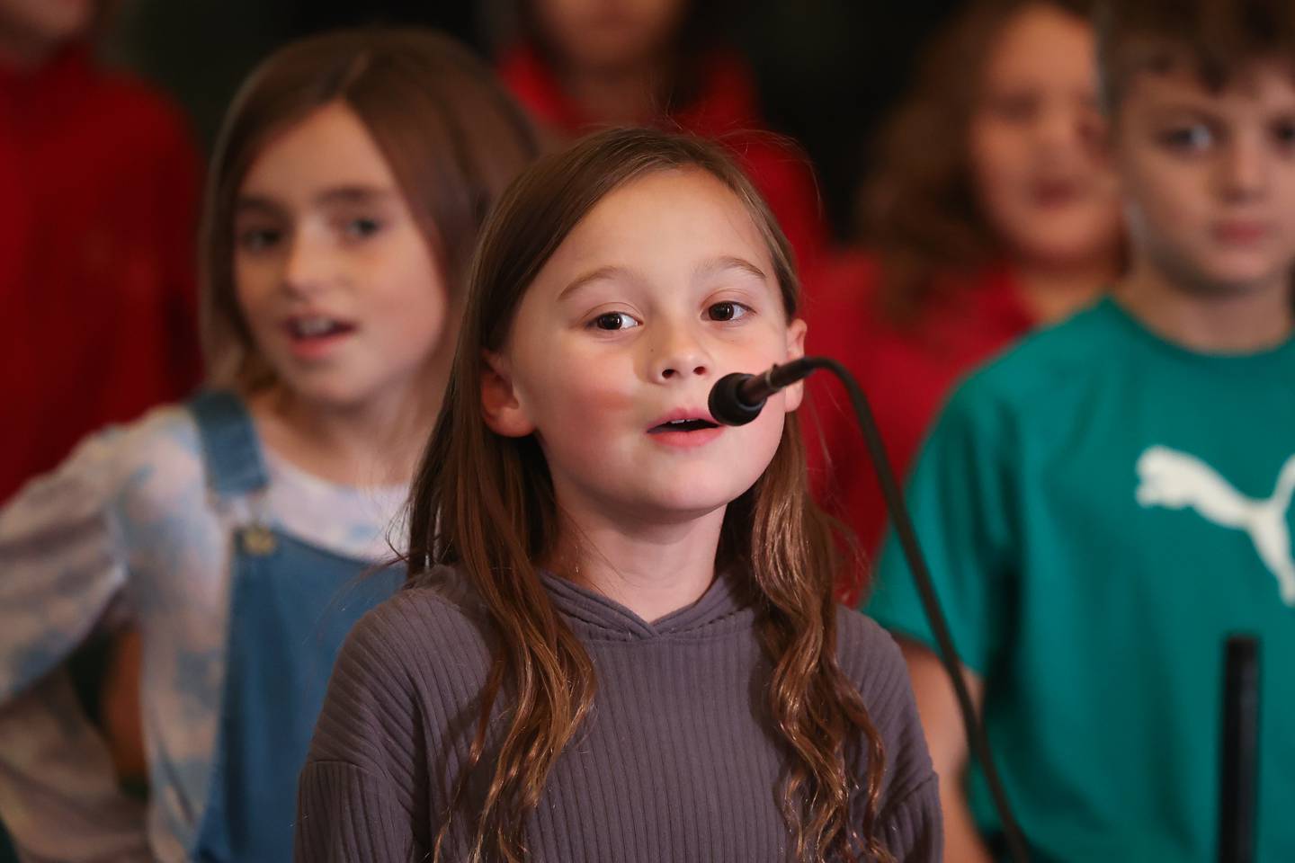 Rory Bianchetto sings Rudolph the Red-Nosed Reindeer during the children’s choir rehearsal at the Cathedral of Saint Raymond Nonnatus for the upcoming A Very Rialto Christmas show.