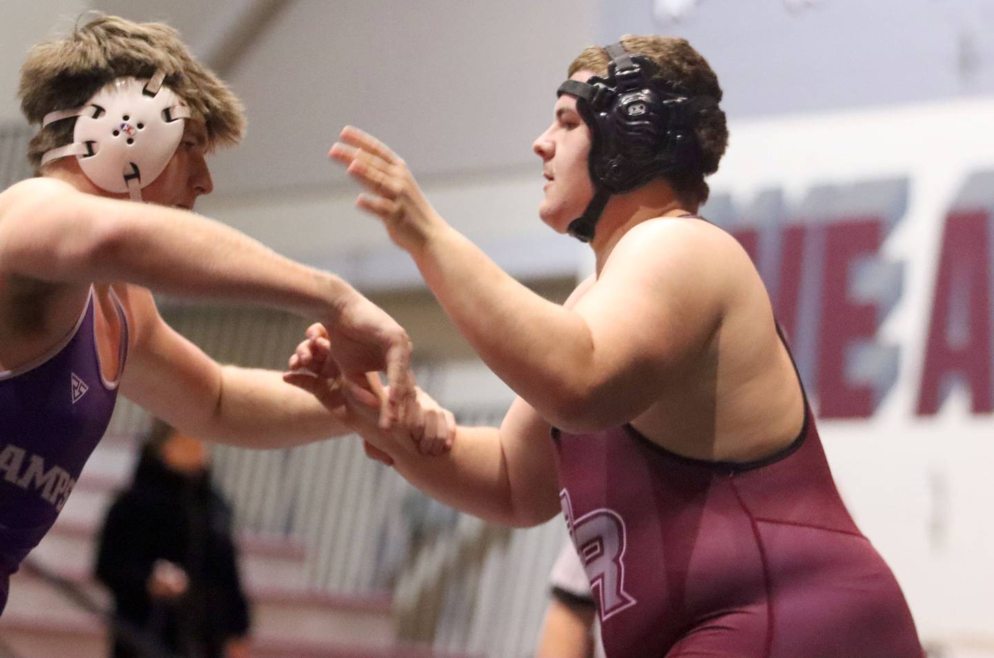 Prairie Ridge’s Bernardo Tavares Vigilato, right, battles Hampshire’s Max Oleferchik at 285 pounds in varsity boys wrestling on Thursday, Dec. 4, 2025, at  Prairie Ridge High School in Crystal Lake.