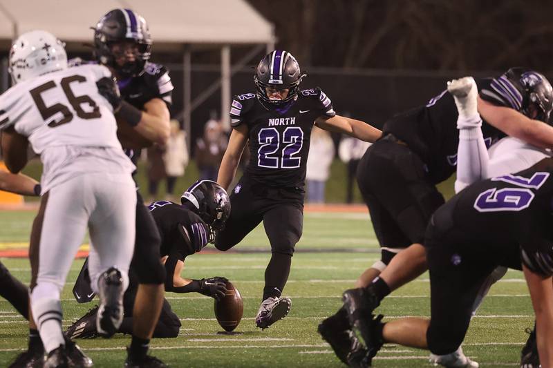 Downers Grove North’s Antonio Kollintzas puts the Trojans on the scoreboard with a field goal against Mt. Carmel in the Class 7A championship on Saturday, Nov. 25, 2023 at Hancock Stadium in Normal.