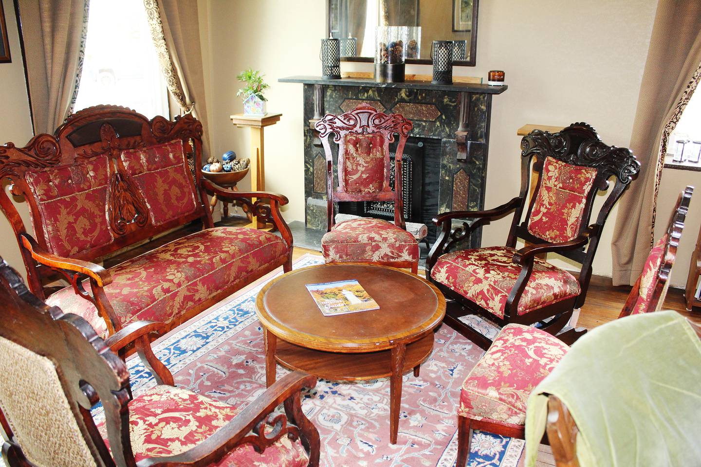 Antique furniture adds to the grace of the lobby of the historic Bridgewater Inn in downtown Mount Carroll.