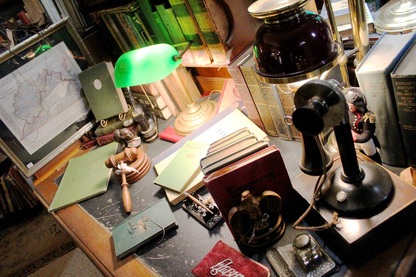 Linda and Len Anderson of The Mad Hatter's Ideas and Designs antique store in Mount Carroll offer a collection of books inside a Victorian style room, among other collectibles and decor. The Andersons have been in business for 25 years, having come from the Chicago area.