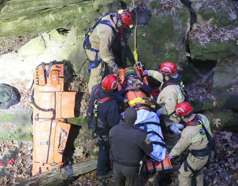 Firefighters lift a patient out of French Canyon who fell 20-30 feet on Tuesday, April 1, 2025 at Starved Rock State Park. A Mutual Aid Box Alarm System (MABAS) prompted rope and rescuers as far as Marseilles and Princeton.