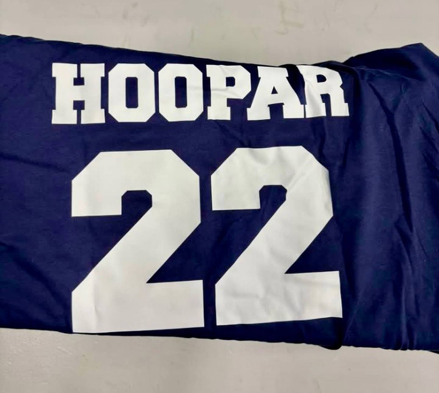 Bureau Valley alum Michael Grieve (2006) enscribed his shirt with "Hoopar 22" in memory of his friend Danny Nelson during Sunday's Alumni Game at the Storm Cellar.