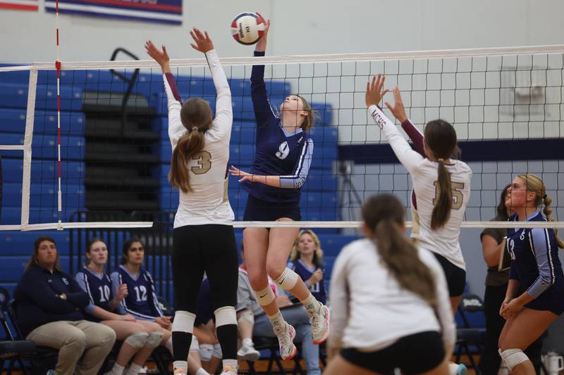 Plainfield South’s Grace Malek hits a shot against Morris on Monday, Sept. 25, 2023 in Plainfield.
