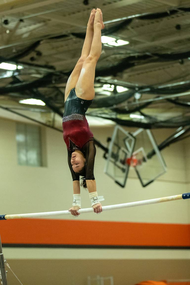 Prairie Ridge gymnast Paige Magel competes on the uneven bars. Magel was a freshman on the team champion at the 2020 IHSA Girls Gymnastics State Meet.
