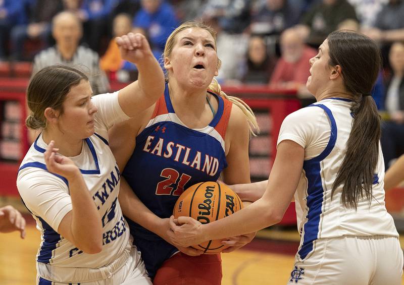 Eastland’s Olivia Klinefelter drives to the hoops against Newman Tuesday, Feb. 18, 2025, during the Class 1A girls basketball regional at Forreston.