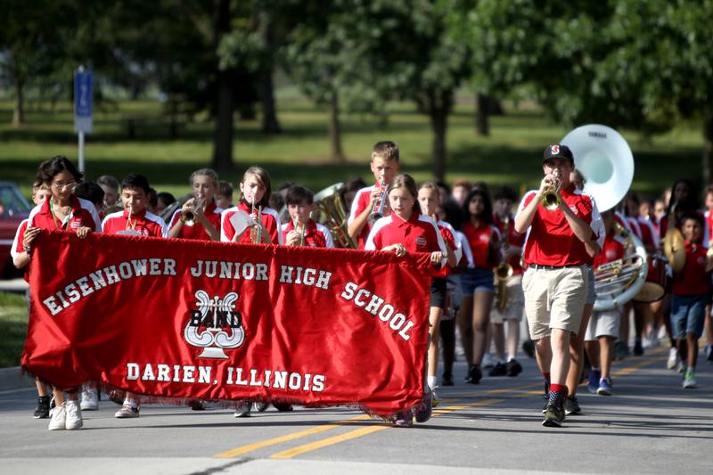 The Eisenhower Junior High School Marching Band performs during the Downers Grove South Homecoming parade on Friday, Sept. 16, 2022.