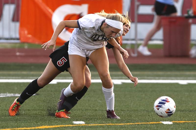 O'Fallon's Addison Baldus tries to keep Barrington's Piper Lucier from getting to the ball during the IHSA Class 3A state championship match at North Central College in Naperville on Saturday, June 3, 2023.