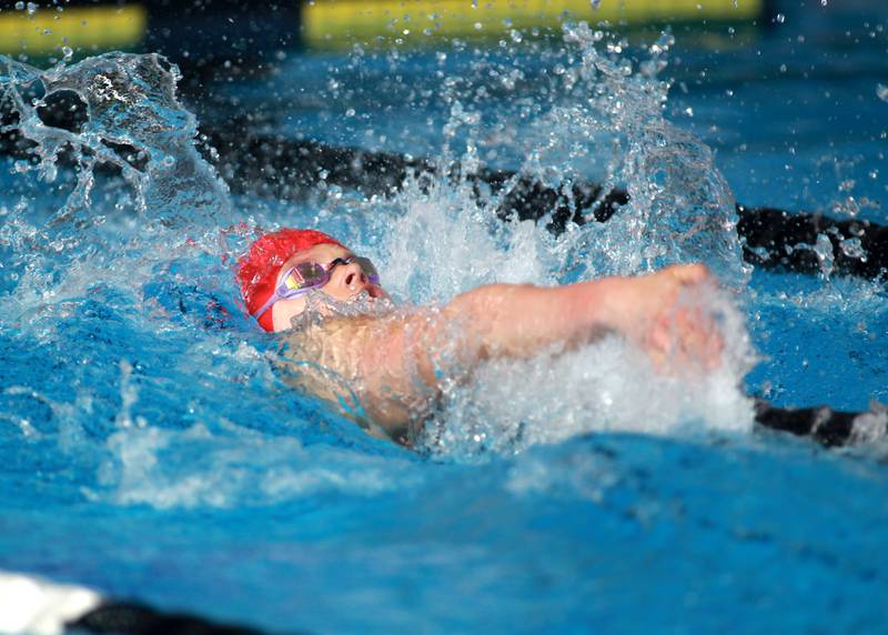 Hinsdale Central’s Karina Miller swims the backstroke leg of the 200-yard medley relay championship heat during the IHSA Girls State Swimming and Diving Championships at the FMC Natatorium in Westmont on Saturday, Nov. 11, 2023.