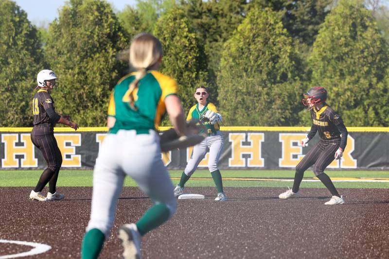 Coal City's Mackenna Stewart calls for the ball as two Herscher players get in a pickle during Coal City's 14-10 victory over Herscher on Monday, April 20, 2026.