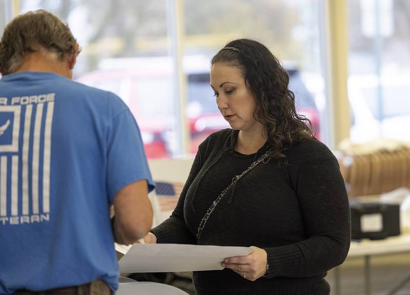 Jamie Garza casts her ballot for the 2024 elections Tuesday, Nov. 5, 2024, at the Rock Falls Community Center.