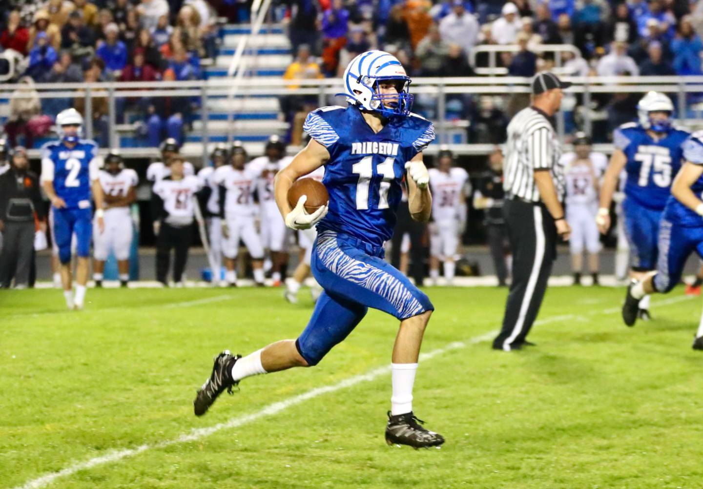 Princeton's Noah LaPorte returns an interception for a 43-yard touchdown Kewanee Friday night.