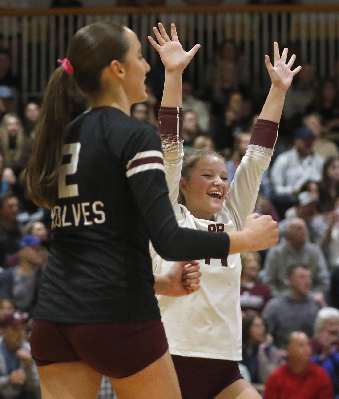 Prairie Ridge's Addison Smith celebrates a point with Tegan Vrbancic during the IHSA Class 3A Carmel Sectional championship volleyball match against Carmel on Thursday, Nov. 6, 2025, at Carmel High School, in Mundelein.