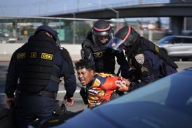 LA police swiftly enforce downtown curfew as protests against Trump’s immigration crackdown continue
