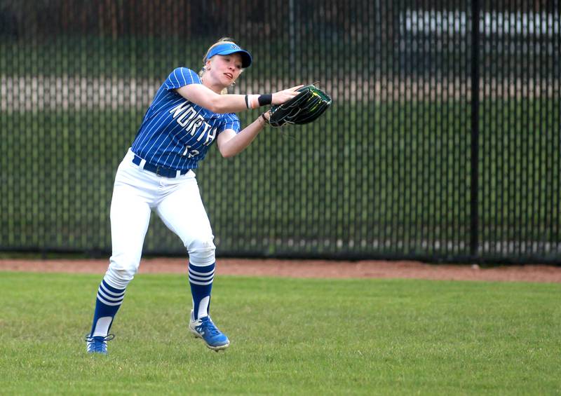 St. Charles North's Faith Maleski makes a catch in the outfield during a game against St. Charles East on Friday, April 25, 2025 at St. Charles North.