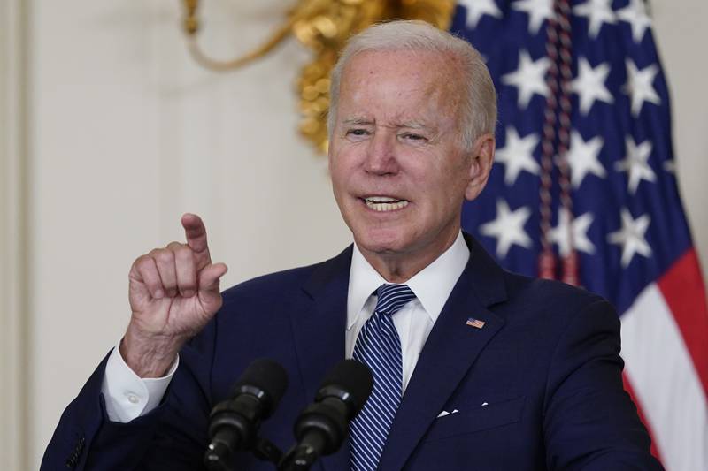 President Joe Biden speaks before signing the Democrats' landmark climate change and health care bill in the State Dining Room of the White House in Washington, Tuesday, Aug. 16, 2022. (AP Photo/Susan Walsh)