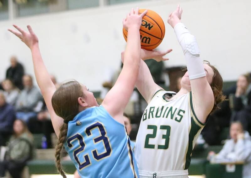 St. Bede's Lili McClain has her shot blocked by Marquette's Kelsey Cuchra on Monday, Dec. 2, 2024 at St. Bede Academy.